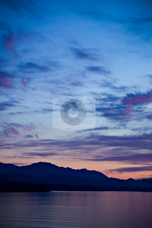 To use this stock image in your creative project, please select the size you need over to the right and click the "Add to Cart" button.
Your downloaded image will come with the Cutcaster watermark removed so don’t worry about the watermark you see on this page. Strait of Juan de Fuca Sunset stock photo, A beautiful sunset over the Strait of Juan de Fuca in Sequim, Washington. by Travis Manley