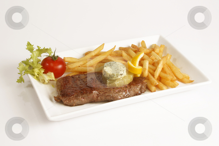 To use this stock image in your creative project, please select the size you need over to the right and click the "Add to Cart" button.
Your downloaded image will come with the Cutcaster watermark removed so don’t worry about the watermark you see on this page. Beef steak stock photo, Grilled beef steak with french fries and sauce served in plate. by Birgit Reitz-Hofmann