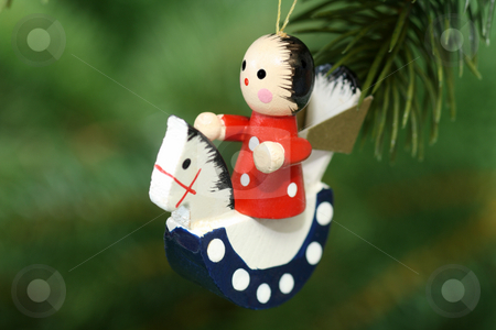 To use this stock image in your creative project, please select the size you need over to the right and click the "Add to Cart" button.
Your downloaded image will come with the Cutcaster watermark removed so don’t worry about the watermark you see on this page. Chrismas angel stock photo, Christmas tree decoration on red background by Birgit Reitz-Hofmann