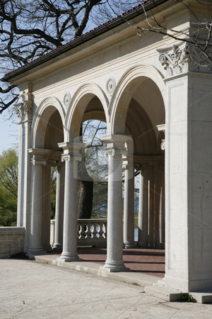 To use this stock image in your creative project, please select the size you need over to the right and click the "Add to Cart" button.
Your downloaded image will come with the Cutcaster watermark removed so don’t worry about the watermark you see on this page. Classical Arches stock photo, Arched Structure with Afternoon Light by Terise Slotkin
