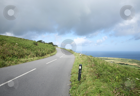 To use this stock image in your creative project, please select the size you need over to the right and click the "Add to Cart" button.
Your downloaded image will come with the Cutcaster watermark removed so don’t worry about the watermark you see on this page. A country road, the B3306, in Penwith, Cornwall, UK stock photo, A country road, the B3306, in Penwith, Cornwall, UK by Stephen Rees