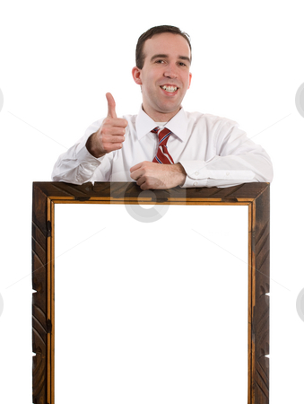 To use this stock image in your creative project, please select the size you need over to the right and click the "Add to Cart" button.
Your downloaded image will come with the Cutcaster watermark removed so don’t worry about the watermark you see on this page. Success stock photo, Businessman giving a thumbs up while leaning on an empty frame for your text by Richard Nelson