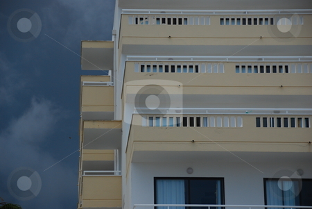 To use this stock image in your creative project, please select the size you need over to the right and click the "Add to Cart" button.
Your downloaded image will come with the Cutcaster watermark removed so don’t worry about the watermark you see on this page. Apartment building stock photo, Apartment building agains the dark cloudy sky by Wolfgang Zintl