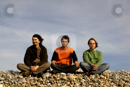 To use this stock image in your creative project, please select the size you need over to the right and click the "Add to Cart" button.
Your downloaded image will come with the Cutcaster watermark removed so don’t worry about the watermark you see on this page. Three stock photo, Three casual young men at the beach by Rui Vale de Sousa
