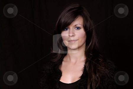 To use this stock image in your creative project, please select the size you need over to the right and click the "Add to Cart" button.
Your downloaded image will come with the Cutcaster watermark removed so don’t worry about the watermark you see on this page. Pretty stock photo, Pretty young woman portrait, isolated on black background by Rui Vale de Sousa