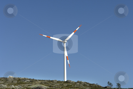 To use this stock image in your creative project, please select the size you need over to the right and click the "Add to Cart" button.
Your downloaded image will come with the Cutcaster watermark removed so don’t worry about the watermark you see on this page. Turbine stock photo, Modern white wind turbine or wind mill producing energy by Rui Vale de Sousa