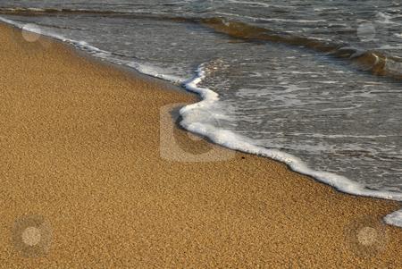 To use this stock image in your creative project, please select the size you need over to the right and click the "Add to Cart" button.
Your downloaded image will come with the Cutcaster watermark removed so don’t worry about the watermark you see on this page. Beach stock photo, Wave in the sand at the beach by Rui Vale de Sousa