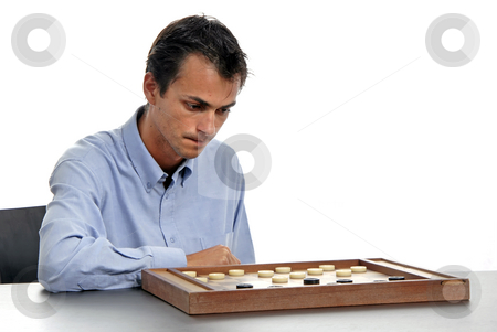 To use this stock image in your creative project, please select the size you need over to the right and click the "Add to Cart" button.
Your downloaded image will come with the Cutcaster watermark removed so don’t worry about the watermark you see on this page. Playing stock photo, Young man playing a game isolated on white by Rui Vale de Sousa