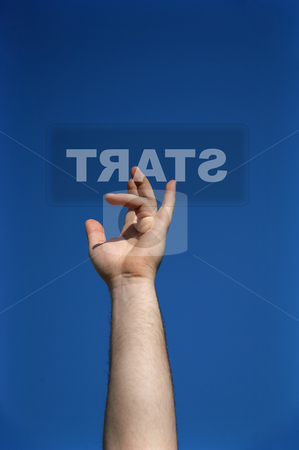 To use this stock image in your creative project, please select the size you need over to the right and click the "Add to Cart" button.
Your downloaded image will come with the Cutcaster watermark removed so don’t worry about the watermark you see on this page. Start stock photo, Human hand press the start button, with the sky as background by Rui Vale de Sousa