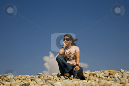 To use this stock image in your creative project, please select the size you need over to the right and click the "Add to Cart" button.
Your downloaded image will come with the Cutcaster watermark removed so don’t worry about the watermark you see on this page. Relaxed stock photo, Young woman at the beach with the sky as background by Rui Vale de Sousa