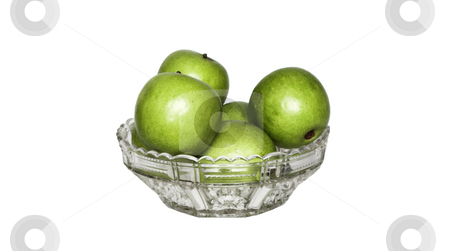 To use this stock image in your creative project, please select the size you need over to the right and click the "Add to Cart" button.
Your downloaded image will come with the Cutcaster watermark removed so don’t worry about the watermark you see on this page. Bowl of apples stock photo, A crystal bowl sits full of apples by Matt Baker