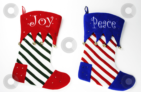 To use this stock image in your creative project, please select the size you need over to the right and click the "Add to Cart" button.
Your downloaded image will come with the Cutcaster watermark removed so don’t worry about the watermark you see on this page. Christmas Stocking stock photo, Christmas stockings ready to be hung by Matt Baker