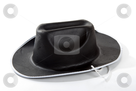 To use this stock image in your creative project, please select the size you need over to the right and click the "Add to Cart" button.
Your downloaded image will come with the Cutcaster watermark removed so don’t worry about the watermark you see on this page. Cowboy Hat stock photo, A closeup of an isolated black cowboy hat by Matt Baker