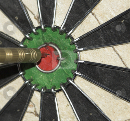 To use this stock image in your creative project, please select the size you need over to the right and click the "Add to Cart" button.
Your downloaded image will come with the Cutcaster watermark removed so don’t worry about the watermark you see on this page. Bullseye stock photo, A dart hits the bullseye by Matt Baker