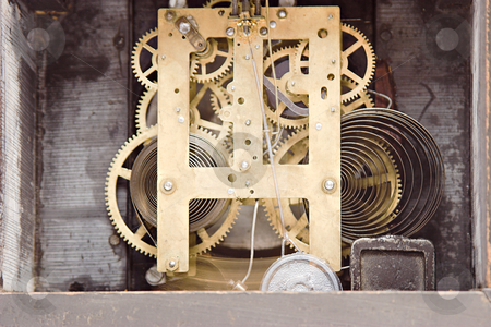 To use this stock image in your creative project, please select the size you need over to the right and click the "Add to Cart" button.
Your downloaded image will come with the Cutcaster watermark removed so don’t worry about the watermark you see on this page. Gears of a clock stock photo, The inside of a mantel clock by Matt Baker