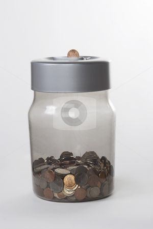 To use this stock image in your creative project, please select the size you need over to the right and click the "Add to Cart" button.
Your downloaded image will come with the Cutcaster watermark removed so don’t worry about the watermark you see on this page. Money jar stock photo, An isolated money jar full of coins by Matt Baker