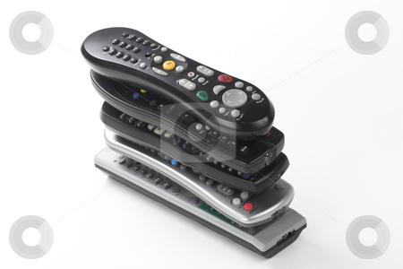 To use this stock image in your creative project, please select the size you need over to the right and click the "Add to Cart" button.
Your downloaded image will come with the Cutcaster watermark removed so don’t worry about the watermark you see on this page. Remote Controler stock photo, A stack of remote controls sits in a pile by Matt Baker