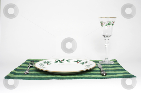 To use this stock image in your creative project, please select the size you need over to the right and click the "Add to Cart" button.
Your downloaded image will come with the Cutcaster watermark removed so don’t worry about the watermark you see on this page. Christmas Dinner stock photo, A complete place setting for Christmas dinner by Matt Baker