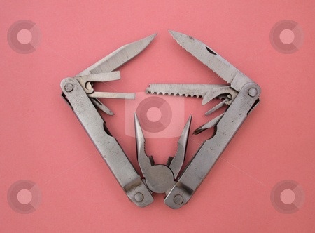 To use this stock image in your creative project, please select the size you need over to the right and click the "Add to Cart" button.
Your downloaded image will come with the Cutcaster watermark removed so don’t worry about the watermark you see on this page. Multipurpose pocketknife. stock photo, Multipurpose pocketknife used by campers and the army all over the world. by Ian Langley