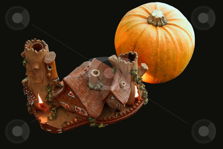To use this stock image in your creative project, please select the size you need over to the right and click the "Add to Cart" button.
Your downloaded image will come with the Cutcaster watermark removed so don’t worry about the watermark you see on this page. Halloween house stock photo, Ceramic house with lightning windows near pumpkin by Sergej Razvodovskij