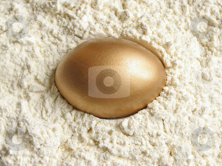 To use this stock image in your creative project, please select the size you need over to the right and click the "Add to Cart" button.
Your downloaded image will come with the Cutcaster watermark removed so don’t worry about the watermark you see on this page. Golden egg stock photo, Golden egg in the meal by Sergej Razvodovskij