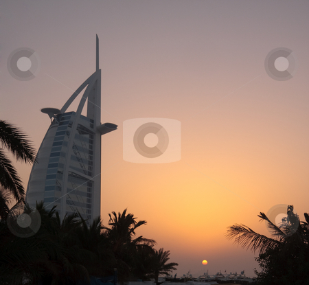 To use this stock image in your creative project, please select the size you need over to the right and click the "Add to Cart" button.
Your downloaded image will come with the Cutcaster watermark removed so don’t worry about the watermark you see on this page. Burj al Arab Hotel in Dubai stock photo, Sunset over the Burj al Arab Hotel in Dubai by Steven Heap