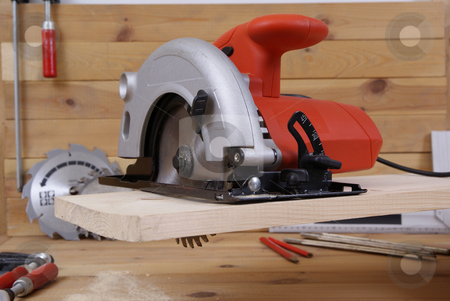 To use this stock image in your creative project, please select the size you need over to the right and click the "Add to Cart" button.
Your downloaded image will come with the Cutcaster watermark removed so don’t worry about the watermark you see on this page. circular saw stock photo, circular saw and accessories on the board by Jolanta Dabrowska