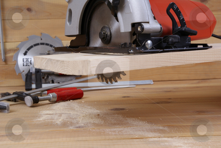 To use this stock image in your creative project, please select the size you need over to the right and click the "Add to Cart" button.
Your downloaded image will come with the Cutcaster watermark removed so don’t worry about the watermark you see on this page. circular saw stock photo, circular saw and accessories on the board by Jolanta Dabrowska