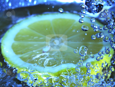 To use this stock image in your creative project, please select the size you need over to the right and click the "Add to Cart" button.
Your downloaded image will come with the Cutcaster watermark removed so don’t worry about the watermark you see on this page. Lemon in Water stock photo, by Kirsty Pargeter