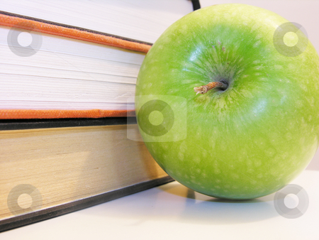 To use this stock image in your creative project, please select the size you need over to the right and click the "Add to Cart" button.
Your downloaded image will come with the Cutcaster watermark removed so don’t worry about the watermark you see on this page. Apple with Books stock photo, by Kirsty Pargeter