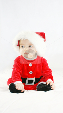 To use this stock image in your creative project, please select the size you need over to the right and click the "Add to Cart" button.
Your downloaded image will come with the Cutcaster watermark removed so don’t worry about the watermark you see on this page. Baby santa stock photo, Baby boy in santas outfit by Kirsty Pargeter