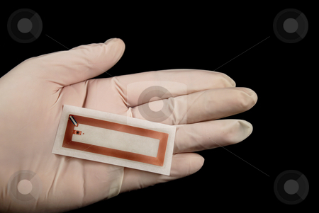 To use this stock image in your creative project, please select the size you need over to the right and click the "Add to Cart" button.
Your downloaded image will come with the Cutcaster watermark removed so don’t worry about the watermark you see on this page. Rfid tags stock photo, Stock picture of wireless tags used for rfid purposes by Albert Lozano