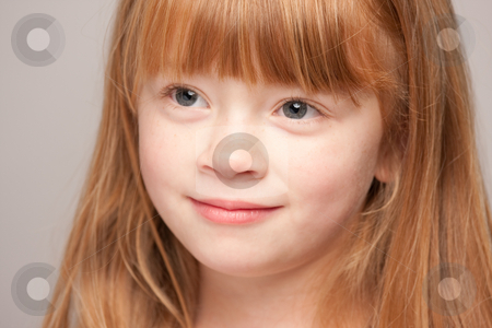 To use this stock image in your creative project, please select the size you need over to the right and click the "Add to Cart" button.
Your downloaded image will come with the Cutcaster watermark removed so don’t worry about the watermark you see on this page. Portrait of an Adorable Red Haired Girl stock photo, Portrait of an Adorable Red Haired Girl on a Grey Background. by Andy Dean