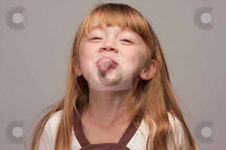 To use this stock image in your creative project, please select the size you need over to the right and click the "Add to Cart" button.
Your downloaded image will come with the Cutcaster watermark removed so don’t worry about the watermark you see on this page. Portrait of an Adorable Red Haired Girl stock photo, Portrait of an Adorable Red Haired Girl on a Grey Background. by Andy Dean
