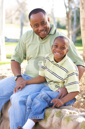 To use this stock image in your creative project, please select the size you need over to the right and click the "Add to Cart" button.
Your downloaded image will come with the Cutcaster watermark removed so don’t worry about the watermark you see on this page. Man and Child Having Fun stock photo, Man and Child Having fun in the park. by Andy Dean
