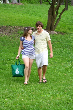To use this stock image in your creative project, please select the size you need over to the right and click the "Add to Cart" button.
Your downloaded image will come with the Cutcaster watermark removed so don’t worry about the watermark you see on this page. Couple cleaning up the park stock photo, Couple showing how it can be fun to clean up a park together. by Chris Torres