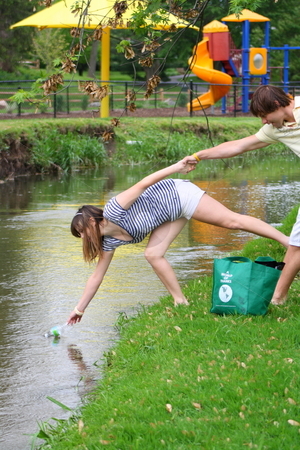 To use this stock image in your creative project, please select the size you need over to the right and click the "Add to Cart" button.
Your downloaded image will come with the Cutcaster watermark removed so don’t worry about the watermark you see on this page. Couple cleaning up the park stock photo, Couple showing how it can be fun to clean up a park together. by Chris Torres