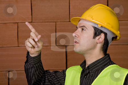 To use this stock image in your creative project, please select the size you need over to the right and click the "Add to Cart" button.
Your downloaded image will come with the Cutcaster watermark removed so don’t worry about the watermark you see on this page. Architect stock photo, Engineer with white hat and a brick wall as background by Rui Vale de Sousa