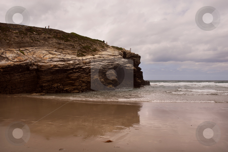 To use this stock image in your creative project, please select the size you need over to the right and click the "Add to Cart" button.
Your downloaded image will come with the Cutcaster watermark removed so don’t worry about the watermark you see on this page. Beach stock photo, Small beach rock in the coast of spain by Rui Vale de Sousa