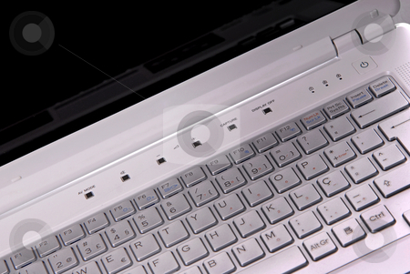 To use this stock image in your creative project, please select the size you need over to the right and click the "Add to Cart" button.
Your downloaded image will come with the Cutcaster watermark removed so don’t worry about the watermark you see on this page. Keyboard stock photo, White laptop keyboard detail. Shallow depth of field by Rui Vale de Sousa
