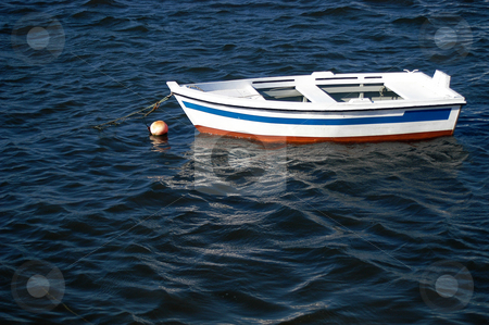 To use this stock image in your creative project, please select the size you need over to the right and click the "Add to Cart" button.
Your downloaded image will come with the Cutcaster watermark removed so don’t worry about the watermark you see on this page. Boat stock photo, Boat in the sea by Rui Vale de Sousa