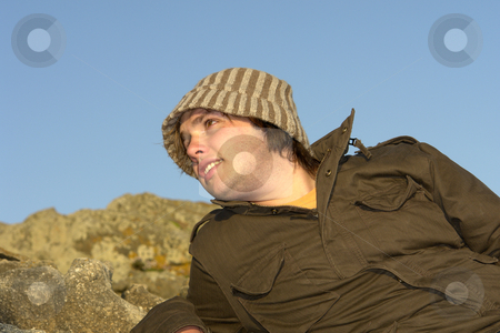 To use this stock image in your creative project, please select the size you need over to the right and click the "Add to Cart" button.
Your downloaded image will come with the Cutcaster watermark removed so don’t worry about the watermark you see on this page. Laid stock photo, Young man at the rocky beach with a hat by Rui Vale de Sousa
