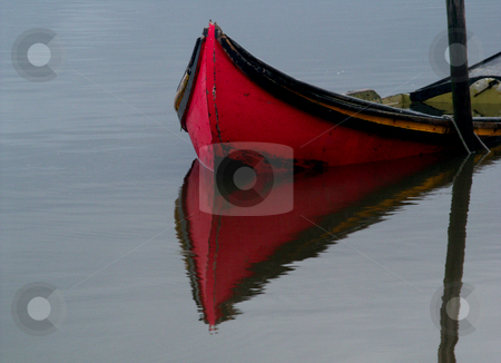 To use this stock image in your creative project, please select the size you need over to the right and click the "Add to Cart" button.
Your downloaded image will come with the Cutcaster watermark removed so don’t worry about the watermark you see on this page. Mirror stock photo, Boat reflection by Rui Vale de Sousa