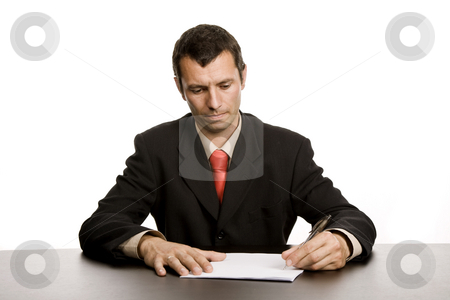 To use this stock image in your creative project, please select the size you need over to the right and click the "Add to Cart" button.
Your downloaded image will come with the Cutcaster watermark removed so don’t worry about the watermark you see on this page. Writing stock photo, Young business man writing on a desk by Rui Vale de Sousa