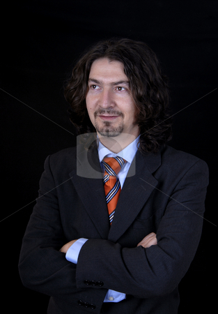 To use this stock image in your creative project, please select the size you need over to the right and click the "Add to Cart" button.
Your downloaded image will come with the Cutcaster watermark removed so don’t worry about the watermark you see on this page. Portrait stock photo, Young business man portrait on white background by Rui Vale de Sousa