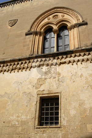 To use this stock image in your creative project, please select the size you need over to the right and click the "Add to Cart" button.
Your downloaded image will come with the Cutcaster watermark removed so don’t worry about the watermark you see on this page. Gothic stock photo, Medieval gothic window of an ancient house in the island of Malta by Rui Vale de Sousa