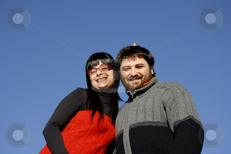 To use this stock image in your creative project, please select the size you need over to the right and click the "Add to Cart" button.
Your downloaded image will come with the Cutcaster watermark removed so don’t worry about the watermark you see on this page. Happy stock photo, Young couple with the sky as background by Rui Vale de Sousa