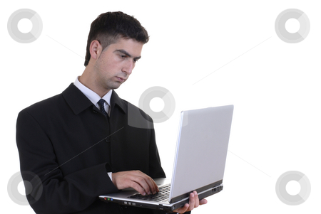 To use this stock image in your creative project, please select the size you need over to the right and click the "Add to Cart" button.
Your downloaded image will come with the Cutcaster watermark removed so don’t worry about the watermark you see on this page. Working stock photo, Young man working with a personal computer by Rui Vale de Sousa