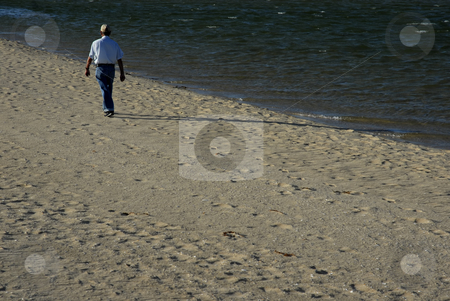 To use this stock image in your creative project, please select the size you need over to the right and click the "Add to Cart" button.
Your downloaded image will come with the Cutcaster watermark removed so don’t worry about the watermark you see on this page. Walking stock photo, Old man walking in the beach sand by Rui Vale de Sousa