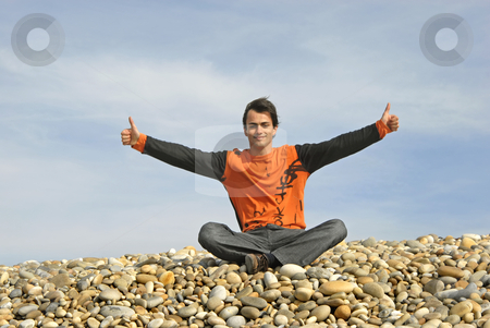 To use this stock image in your creative project, please select the size you need over to the right and click the "Add to Cart" button.
Your downloaded image will come with the Cutcaster watermark removed so don’t worry about the watermark you see on this page. Happy stock photo, Man with arms wide open at the beach by Rui Vale de Sousa